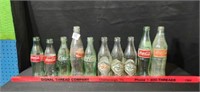Group of Coca Cola Bottles