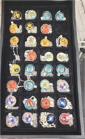 TRAY OF CARTOON AND COMIC NECKLACES