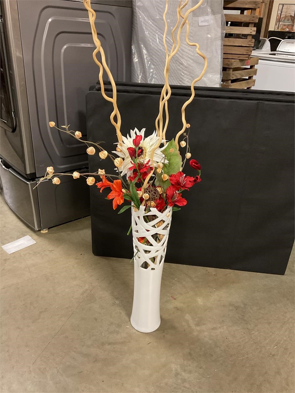 Floor vase with arrangement