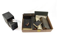Vintage Box Camera and Flat of Old Bibles