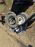 PALLET WITH MISC,  IMPLEMENT TIRES, RIMS