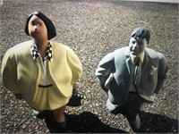 Large man and woman figurines
