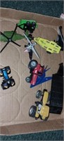 Lot with toy planes tractors and more