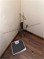 Bathroom scale and toilet paper holder