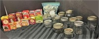 Assortment of glass jars and snap lids small