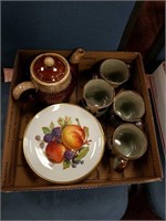 Box with hand painted cups, plates and mug