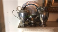 Group of five pieces of pewter including a