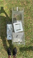 Three metal trapping cages