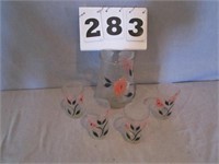 Vintage juice/water pitcher with four glasses