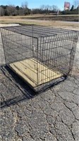 Large dog cage with a little damage on front