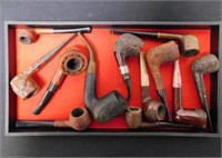 COLLECTION OF CARVED SMOKING PIPES