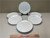 SET OF SEVEN ENAMELWARE PLATES