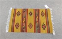 Native American style rug with fringe 24" x 40"