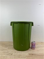 Small green trash bin