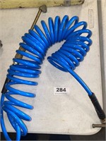 blue coil air hose with inflater nozzle