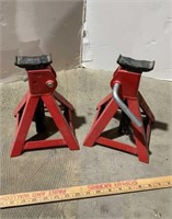 2 matching red jack stands