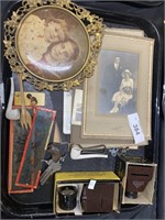 Vintage photos, view finders, ceramic pipes.