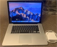 15 Inch Refurbished MacBook Pro w wireless mouse