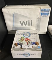 Wii Gaming Console, Remote, Mario Cart Wheel.