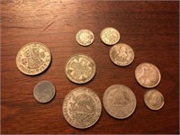 Lot of international coins- some are partial silvr