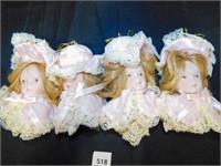 5 dressed in pink doll ceramic head ornaments