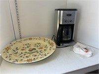 clear plastic tote w/ large platter, coffee maker