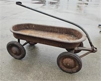 Antique red coaster wagon