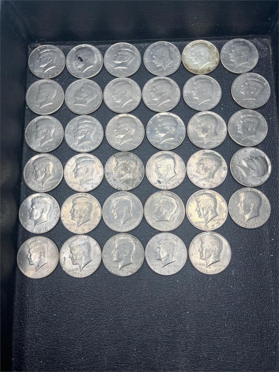 35 U.S. Kennedy half dollars