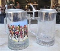 Two glass and metal beer steins