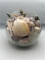 Bowl w fish full of shells