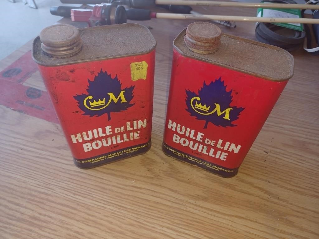 2 Cans, 1 pleine, 1 à la moitié