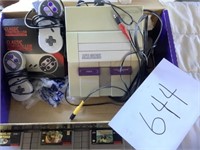 Super Nintendo - 2 controllers and 4 games