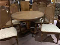 Round fruit wood dining room table and six