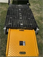 Raised yard equipment storage platform with