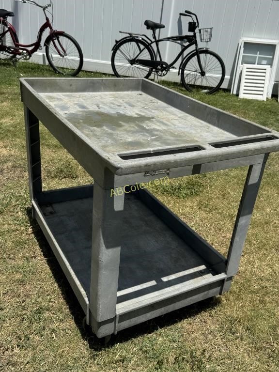Grey resin rolling shop cart
