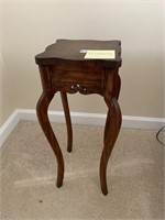 SCALLOPED TOP TABLE W/ CENTER DRAWER TURNED.