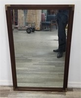 Vintage wall mirror in wood frame w/brass accents