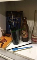 Two old bottles, drink stirrers, bear Cub Scout