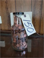 GLASS JAR FILLED WITH PENNY'S