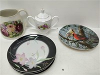 lot of plates, pitcher and other dishes