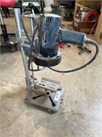 Drill and drill stand