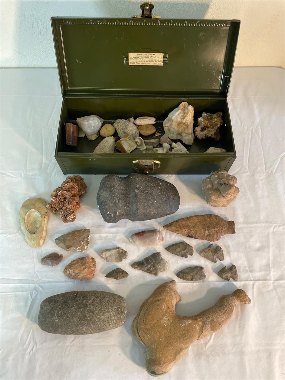 Ancient stone tool, arrow heads, and stones