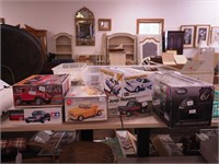 Five car and truck model kits and a 1/18 scale