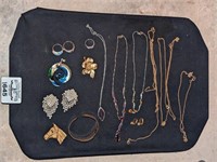 Costume necklaces, brooches, rings