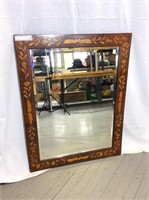 Miroir en bois a verre biseauté marqueté
