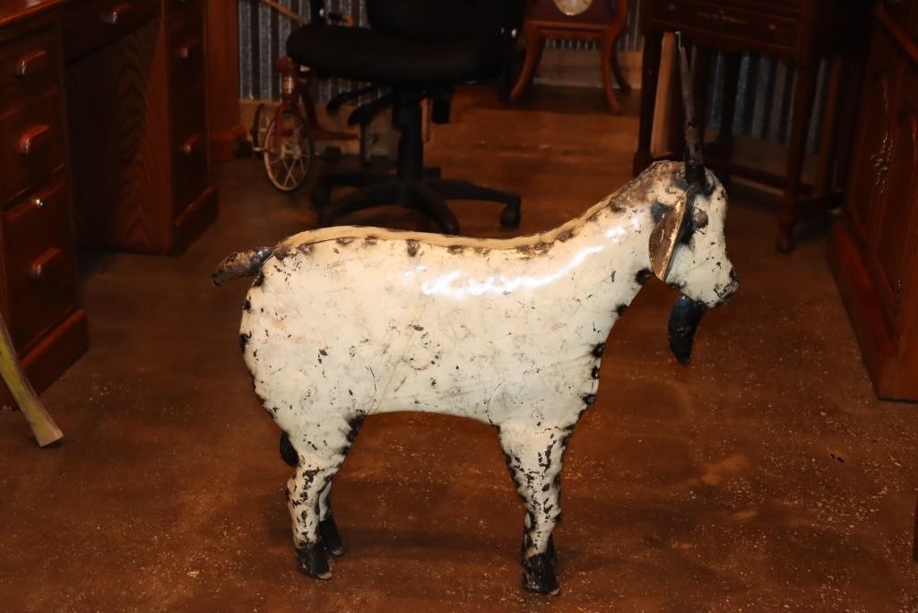 Metal life size goat sculpture 32" long X 34"