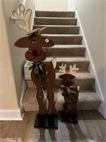 Two wooden light up reindeer