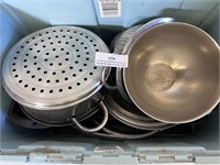 Bin of Metal Cookware