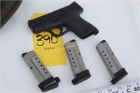 SW 40 pistol, three clips, holster, case