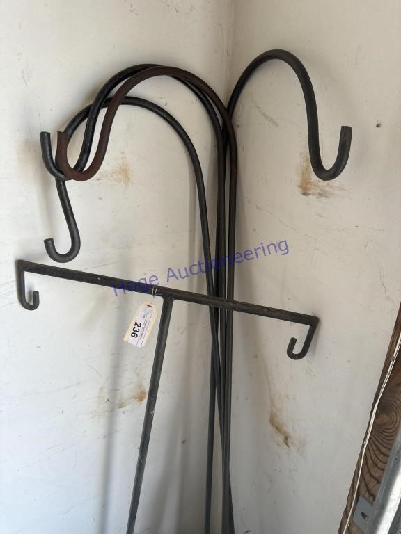 SHEPHERD HOOKS, 3@5.5 FT, 1@ 4.5 FT,  IN GARAGE